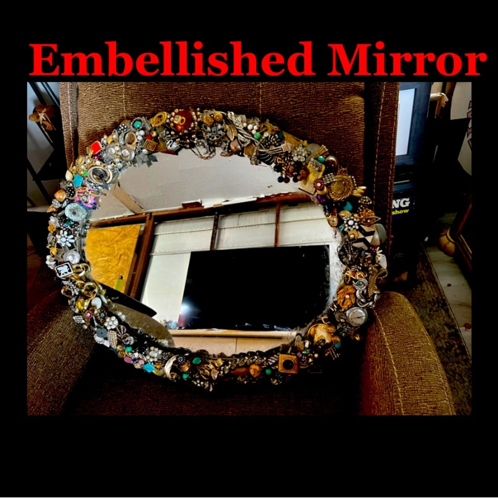 Mirror embellished with vintage jewelry